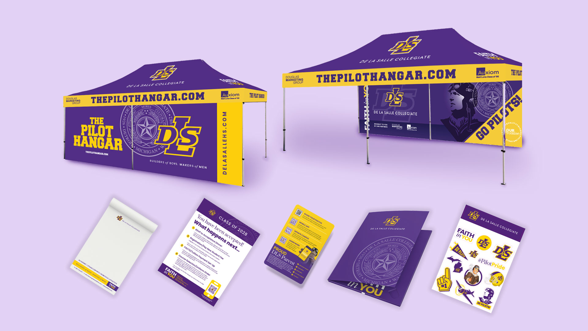 Purple and yellow promotional tent and materials featuring "The Pilot Hangar" and "DLS" logos, along with a website URL and informational brochures and flyers.