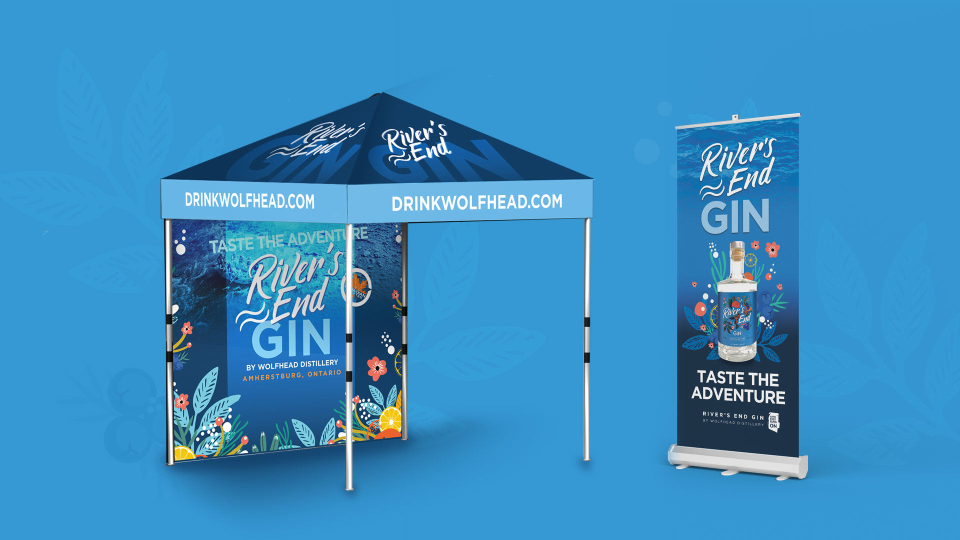 Promotional setup featuring a tent and banner for River's End Gin by Wolfhead Distillery, both with the phrase "Taste the Adventure".