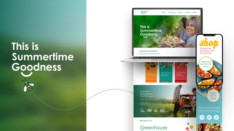 A laptop and smartphone display a website with the text "This is Summertime Goodness," featuring images of people, summer foods, and green-themed branding.
