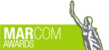MarCom Awards logo featuring a stylized silver figure holding up an object, with "MARCOM AWARDS" in white and green text on a light background.